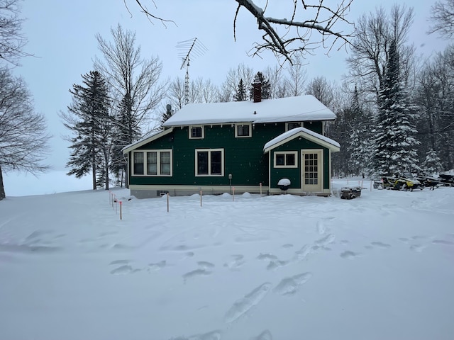 9516 State Highway M64, Marenisco, MI 49947 - view of front facade featuring a chimney