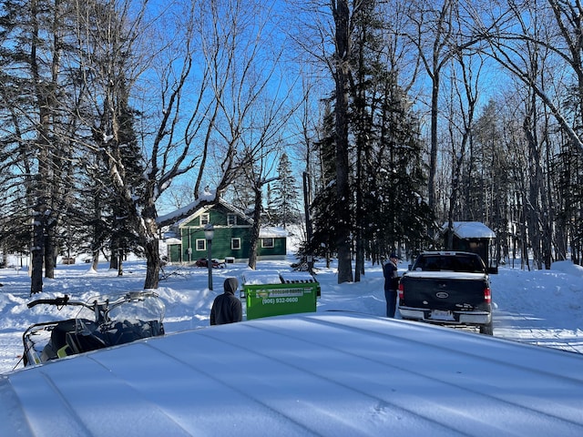 view of yard covered in snow