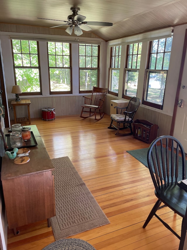 interior space featuring ceiling fan and lofted ceiling