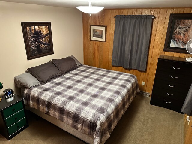 9516 State Highway M64, Marenisco, MI 49947 - carpeted bedroom featuring wood walls