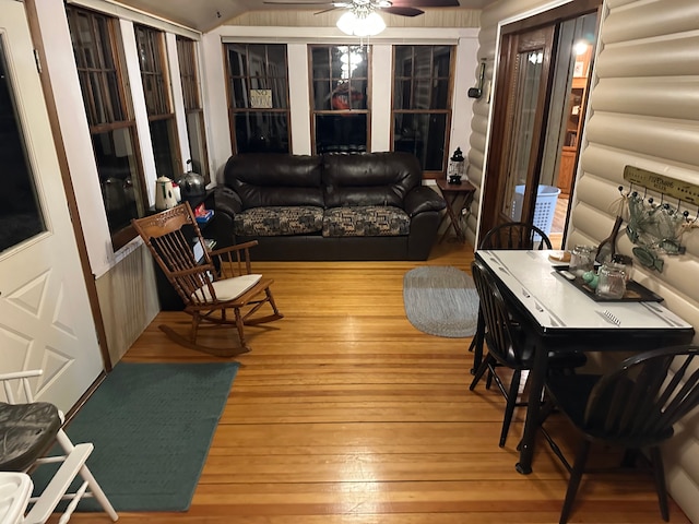 interior space with ceiling fan and lofted ceiling