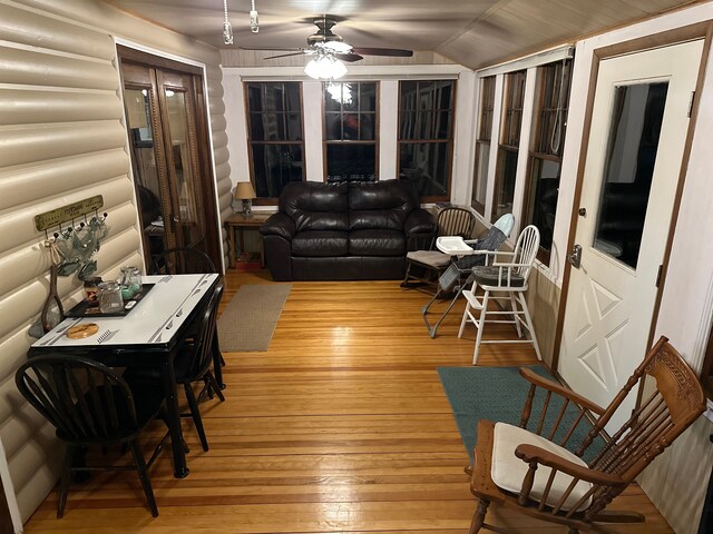 9516 State Highway M64, Marenisco, MI 49947 - living area with ceiling fan, light wood finished floors, and lofted ceiling