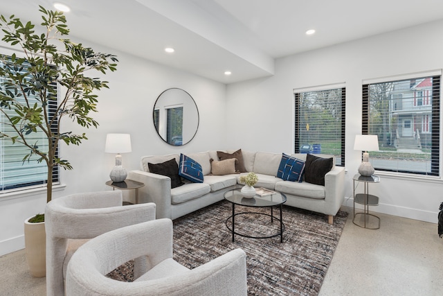 5216 Avery St Unit 9, Detroit, MI 48208 - living area featuring speckled floor, baseboards, and recessed lighting