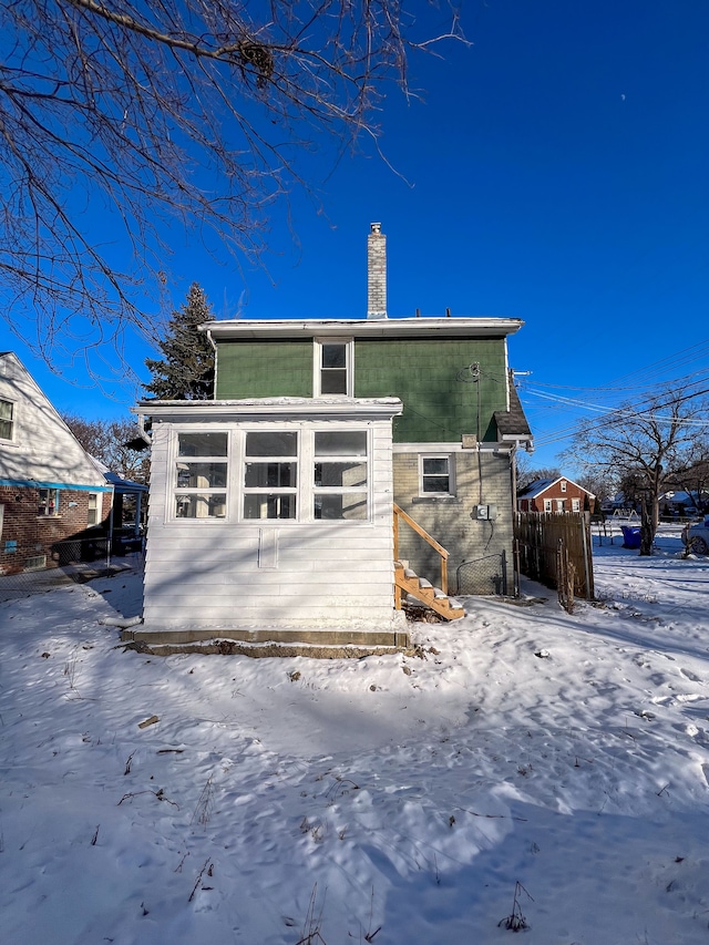 view of snow covered property