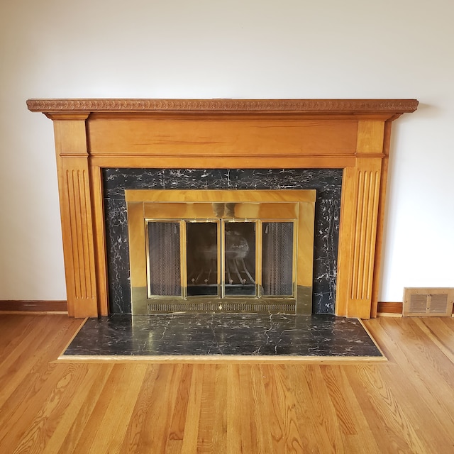 details with wood-type flooring