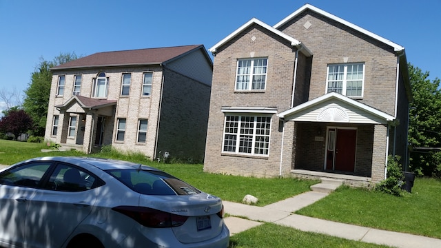 view of front of home with a front yard