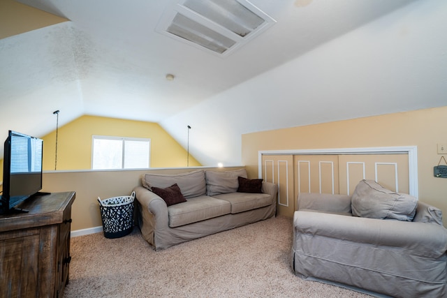 living room featuring light colored carpet and lofted ceiling