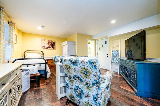 bedroom featuring dark wood-type flooring