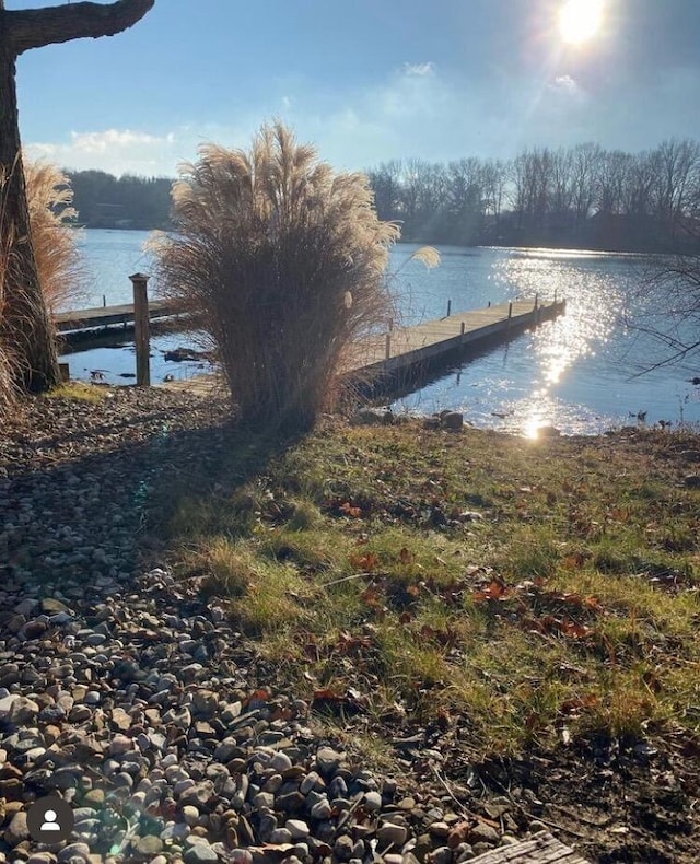 view of dock with a water view