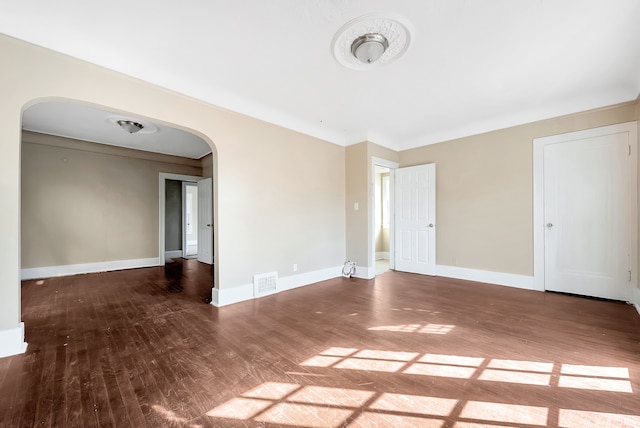 empty room with hardwood / wood-style floors