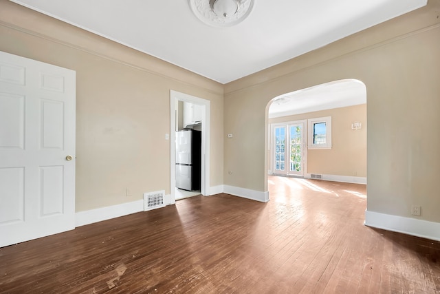 empty room featuring hardwood / wood-style floors