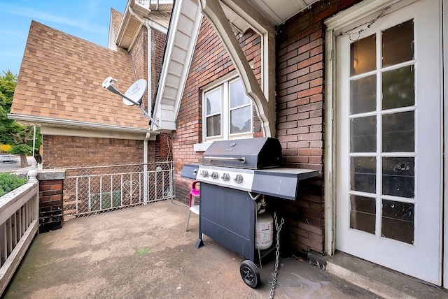 view of patio with a grill