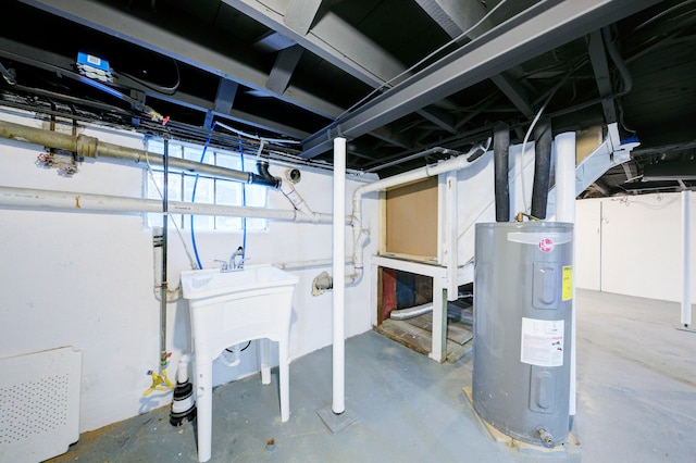 basement featuring electric water heater