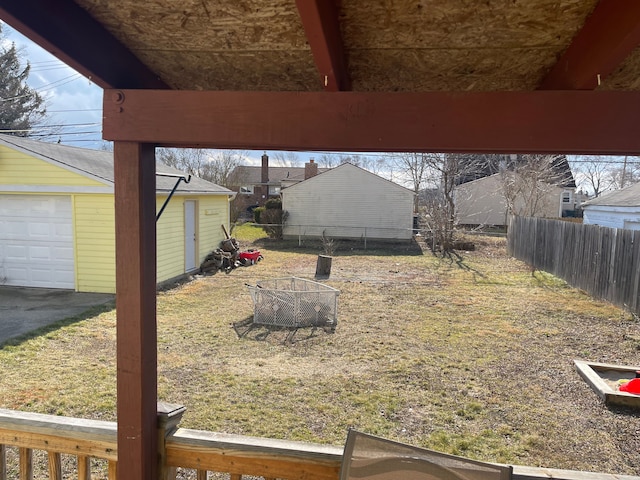 view of yard with an outbuilding and a garage