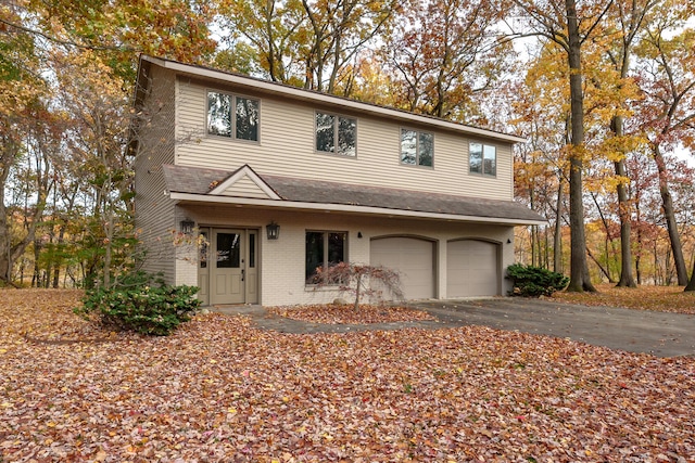 view of front of property featuring a garage