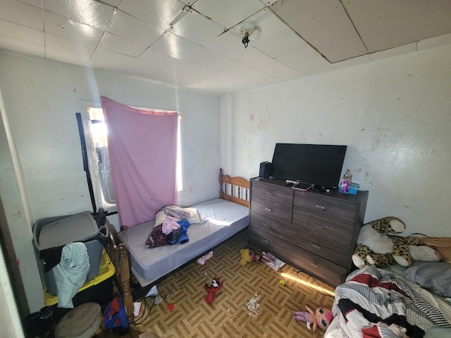 bedroom with parquet floors