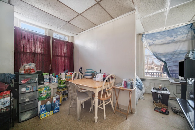 dining room with a paneled ceiling