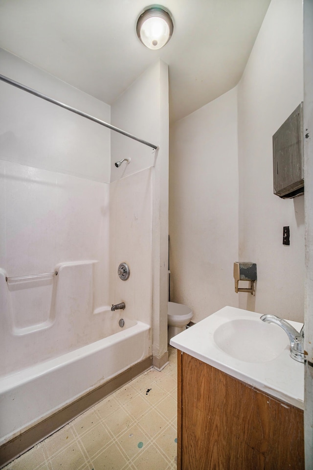 full bathroom with vanity, toilet, and shower / tub combination