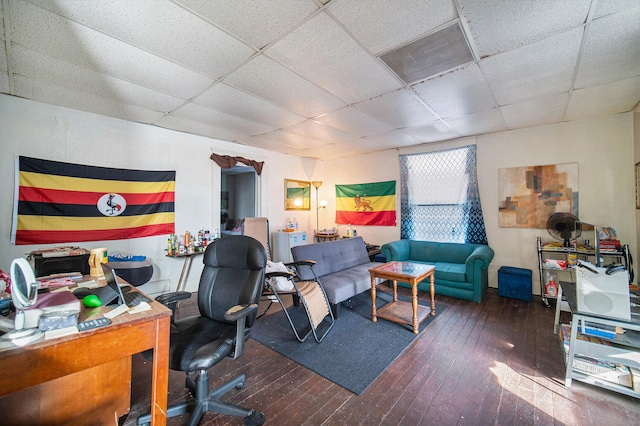 office featuring a paneled ceiling and dark hardwood / wood-style floors