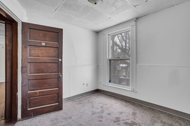 spare room with a drop ceiling