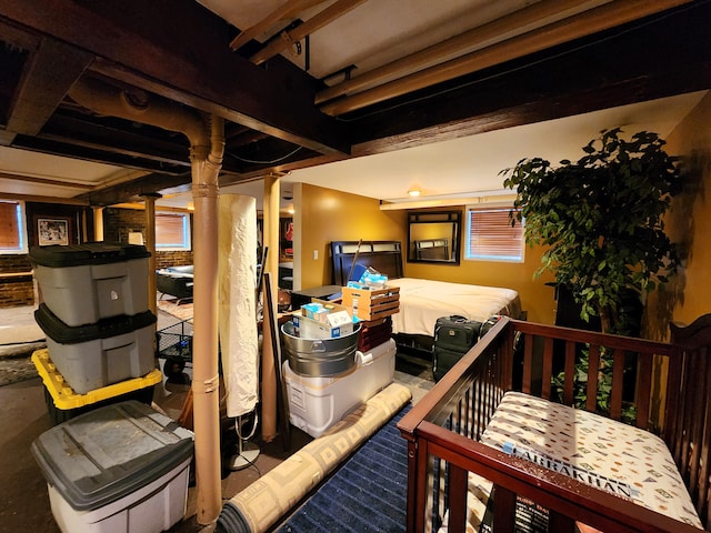 interior space featuring beam ceiling and ornate columns