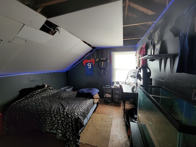 bedroom featuring vaulted ceiling