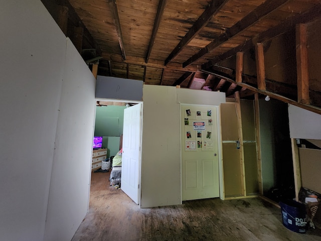 miscellaneous room with dark hardwood / wood-style flooring and wood ceiling