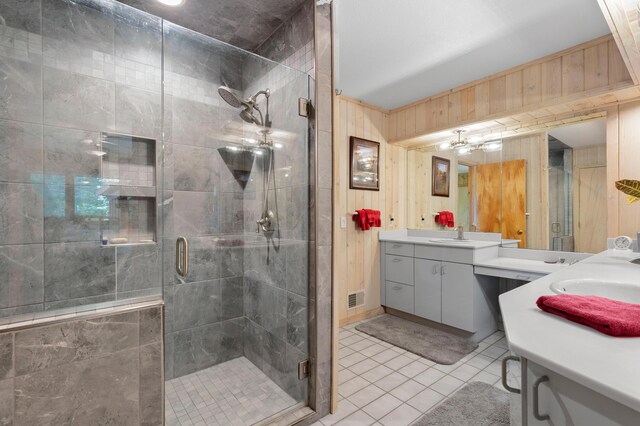 100 W Adams Rd, Farwell, MI 48622 - full bathroom with vanity, tile patterned flooring, a stall shower, and wooden walls