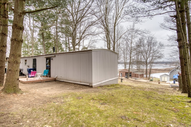 view of yard featuring a wooden deck