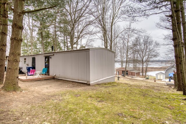 17370 Summit St, Barryton, MI 49305 - view of grassy yard with a wooden deck