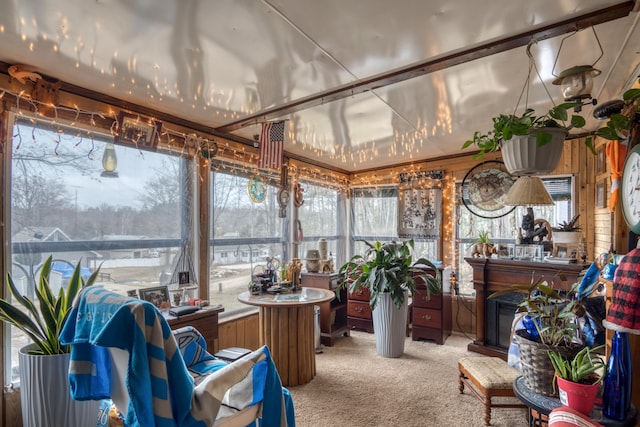 sunroom / solarium with vaulted ceiling