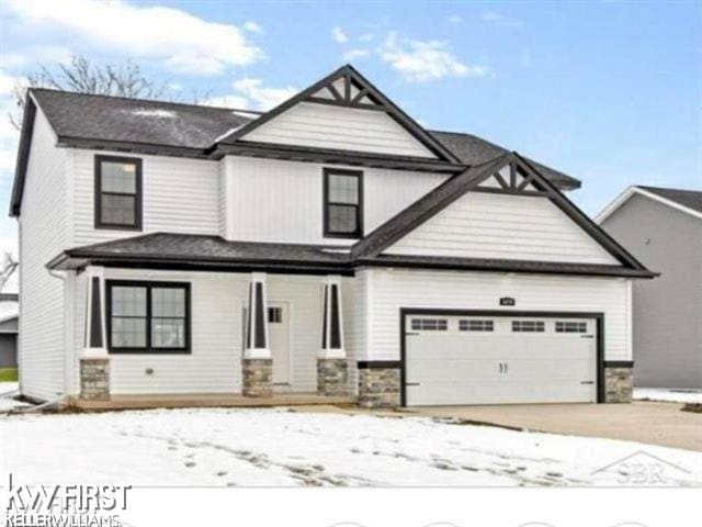 view of front of property with a garage