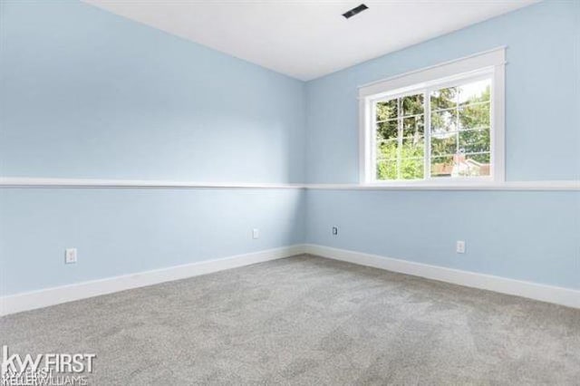 spare room with carpet flooring