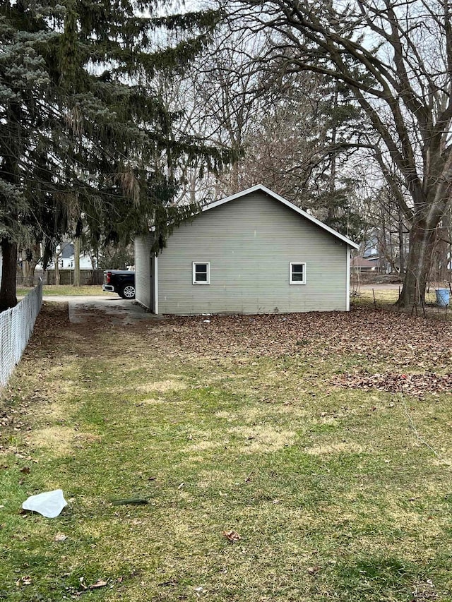 view of home's exterior with a lawn