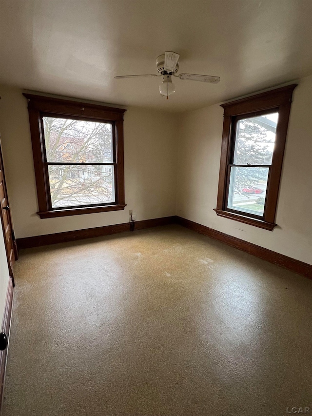 empty room featuring ceiling fan