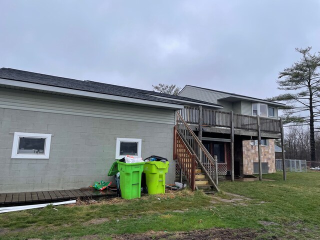 9470 Pontiac Lake Rd, White Lake, MI 48386 - rear view of property with a wooden deck and stairs