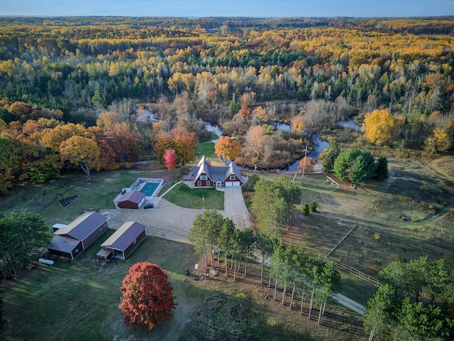 birds eye view of property with a rural view