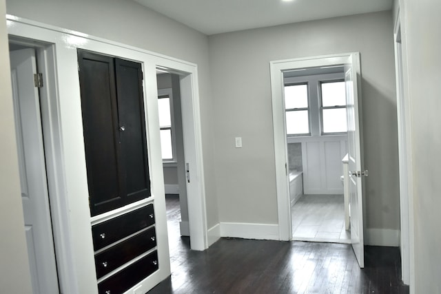 interior space with dark wood-type flooring