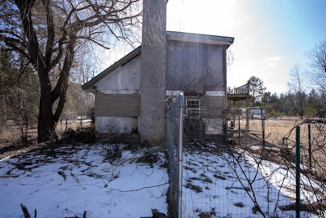 view of snow covered property