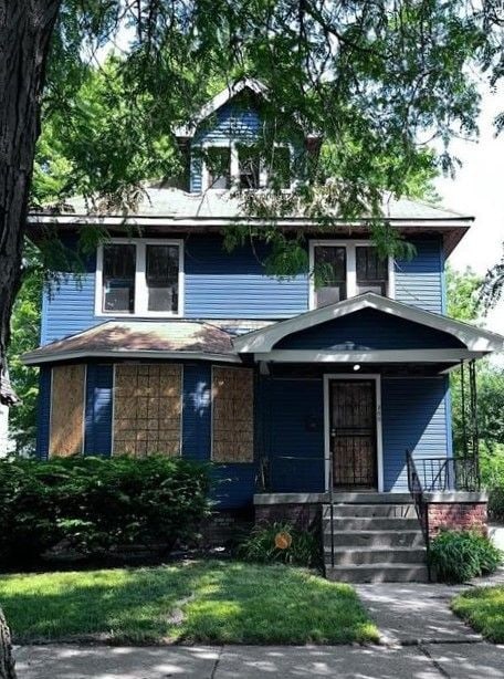 view of front of home featuring covered porch