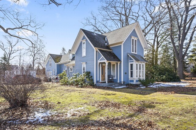 4851 Dowling St, Montague, MI 49437 - view of front of home featuring a shingled roof