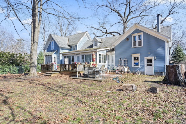 4851 Dowling St, Montague, MI 49437 - back of property with a wooden deck