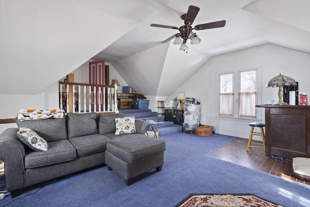 carpeted living room with vaulted ceiling and ceiling fan