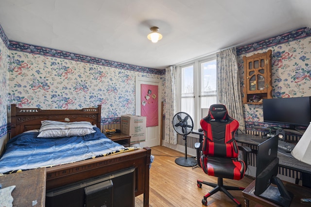 bedroom featuring light wood-type flooring