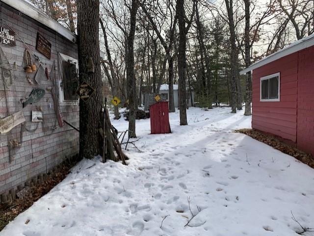 view of yard covered in snow