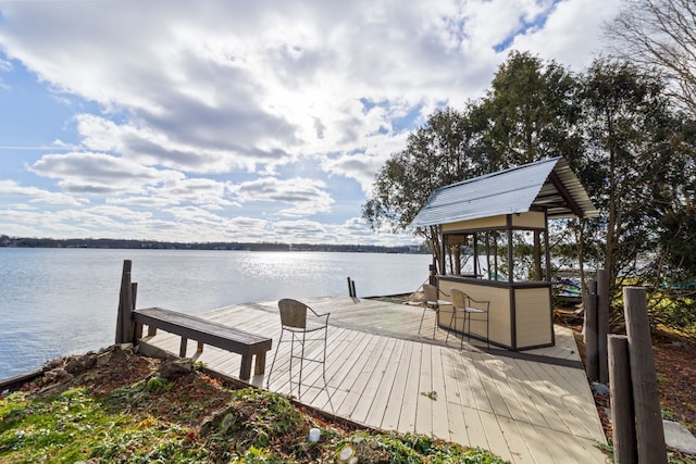 view of dock with a water view