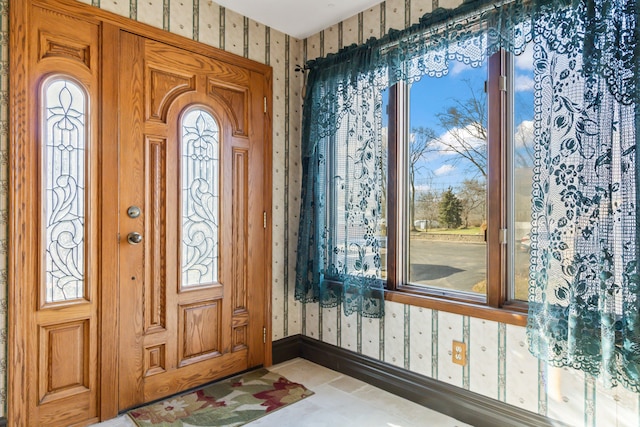 foyer entrance with a wealth of natural light