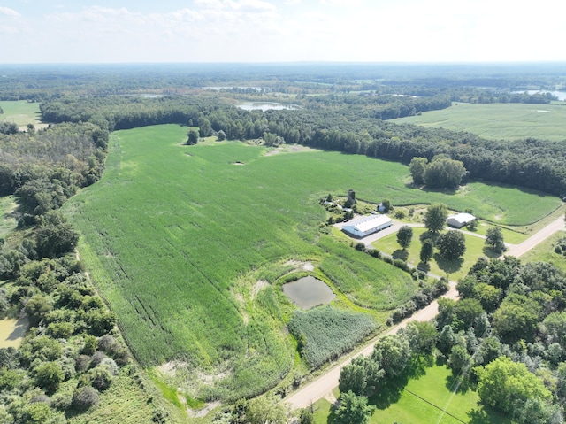 birds eye view of property featuring a rural view