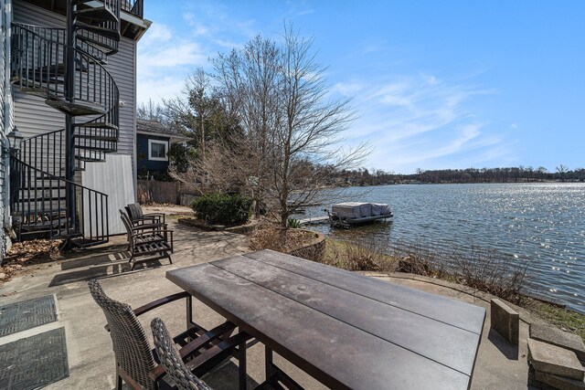 view of patio / terrace featuring a water view