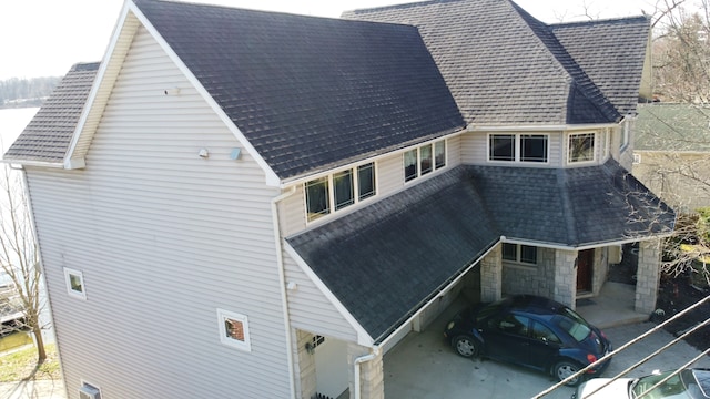 rear view of house with a carport